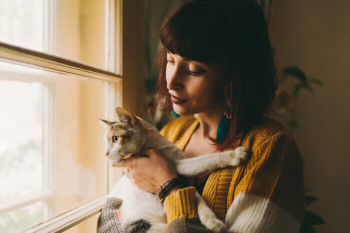 Woman holding cat